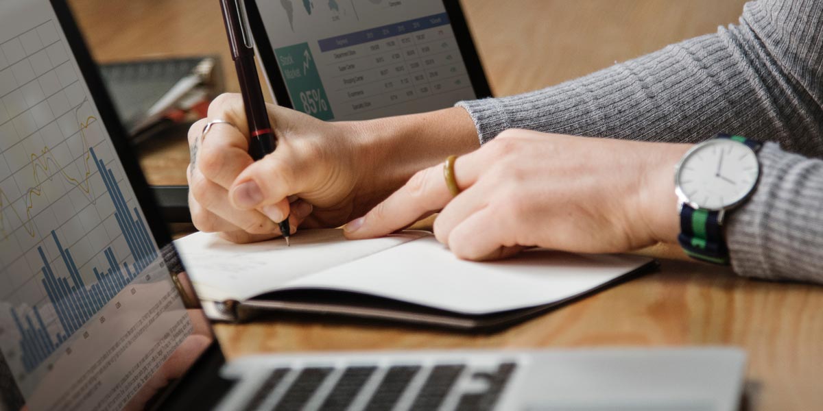 Taking notes while working with a computer and tablet
