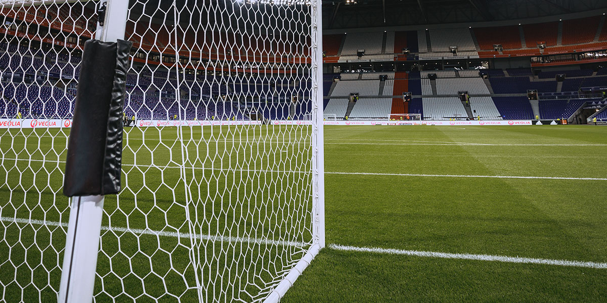 An empty soccer pitch with the goal